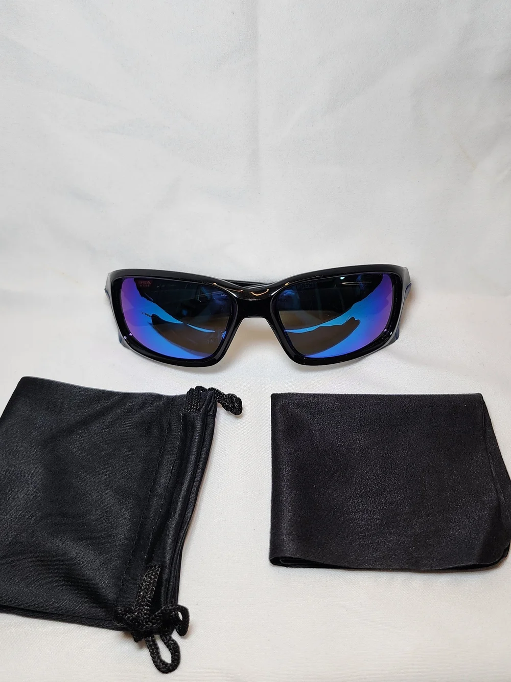 Oakley Black Sunglasses with Blue-Purple Mirrored Lenses